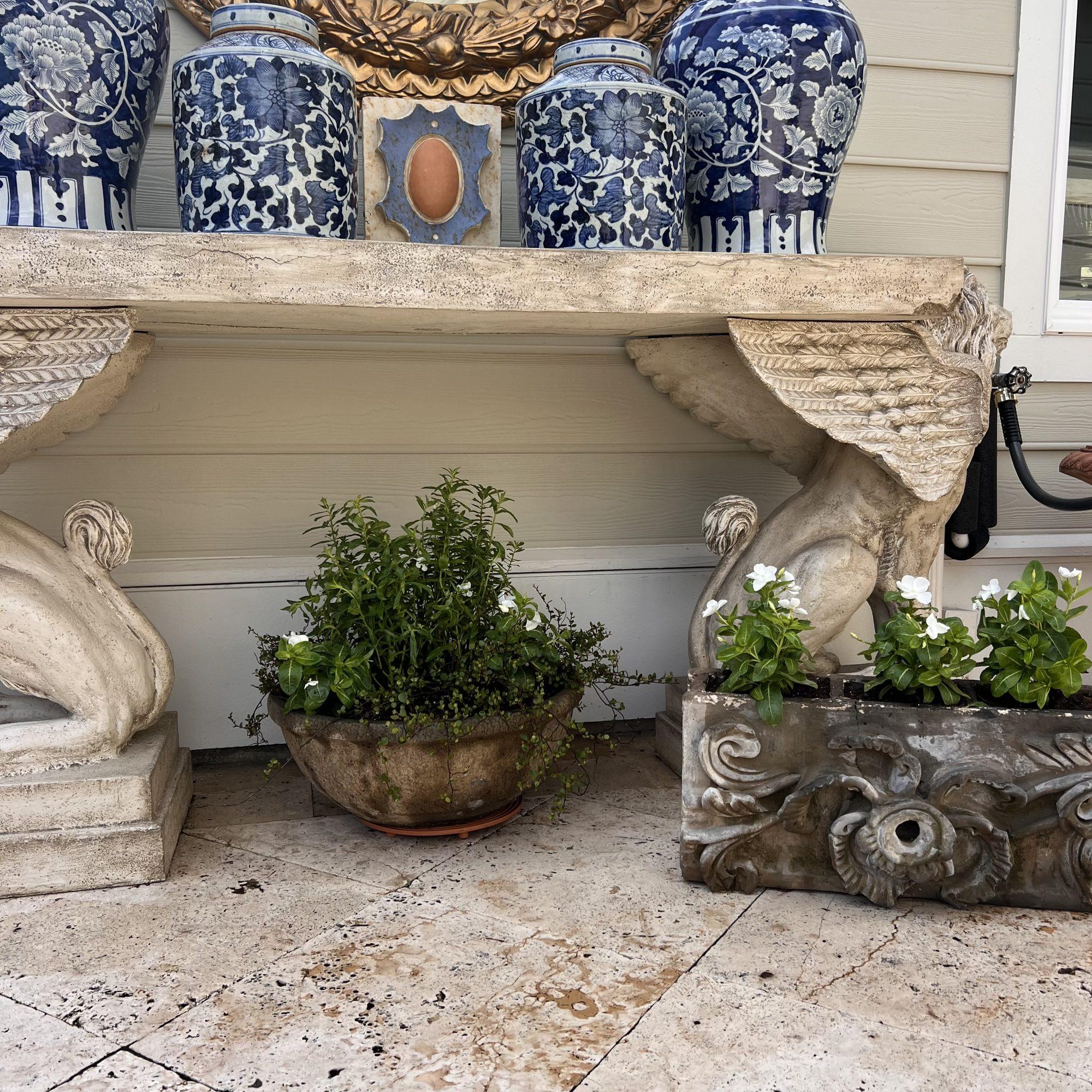 Custom planters styled at a front entry